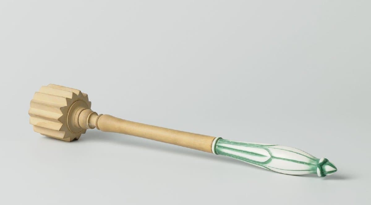 Roerstok met handvat van ivoor