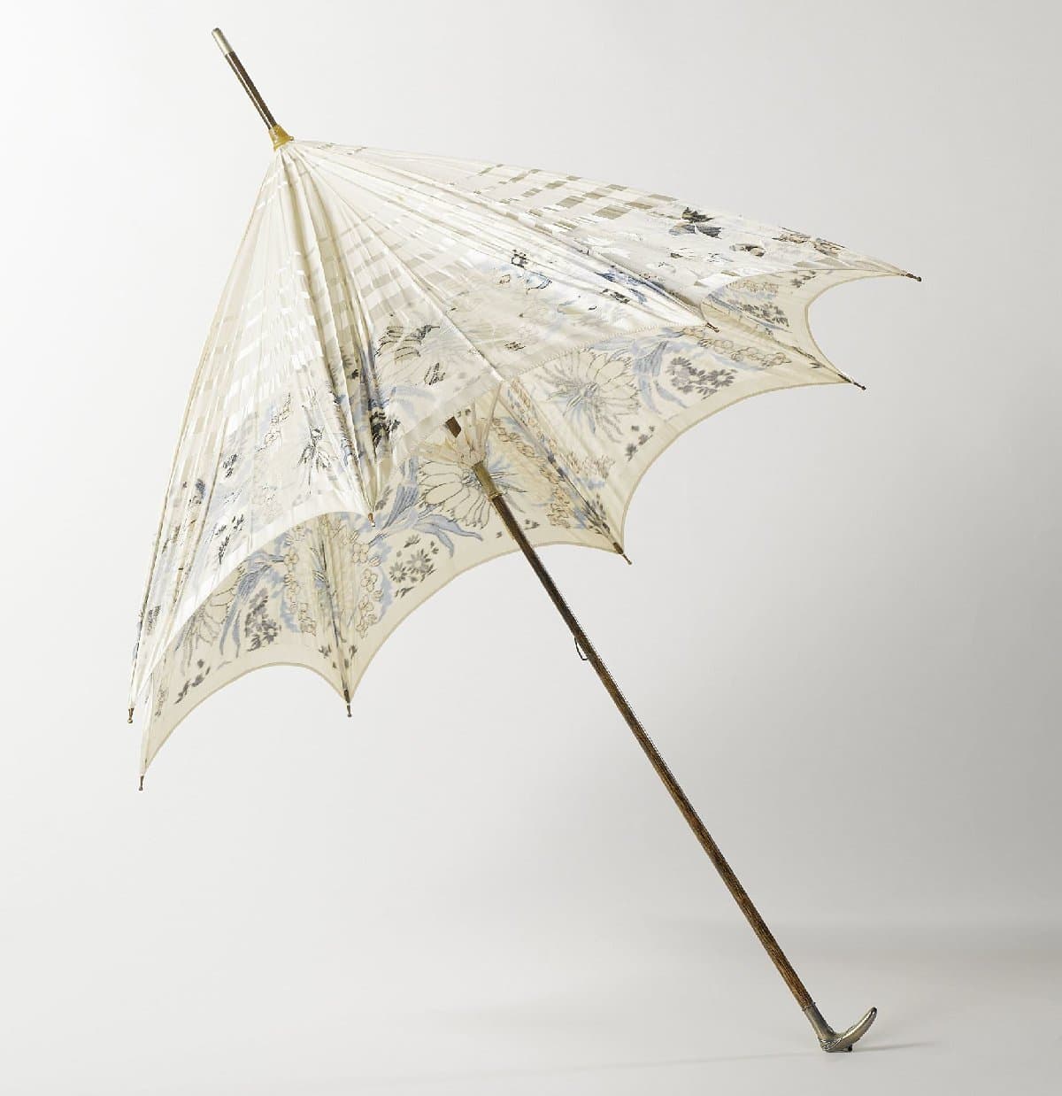 Parasol with woven motif of flowers and butterflies